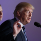 Eric Trump listens Larger Trump speaks during the grand opening of the Trump International Hotel- Old Post Office, Wednesday, Oct. 26, 2016, in Washington. Photo via AP
